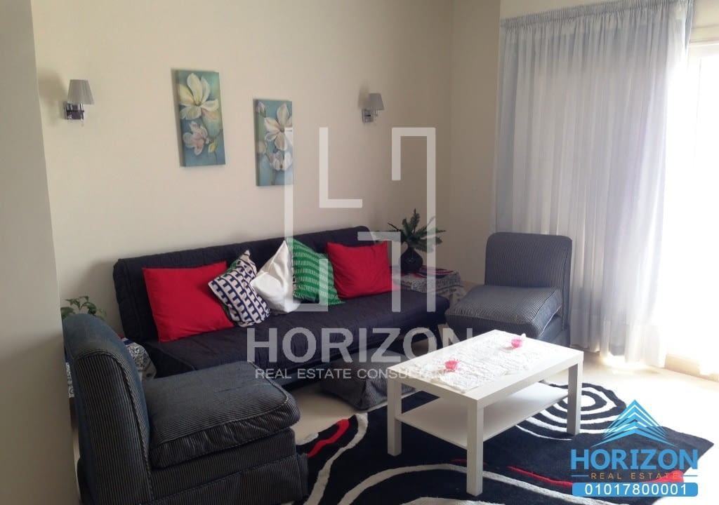 Studio with garden for rent in The Village Palm Hills New Cairo