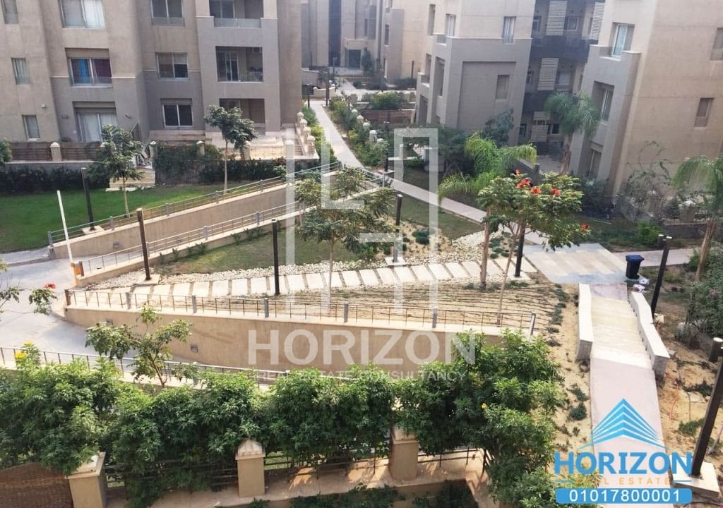 Apartment in The Village Palm Hills New Cairo