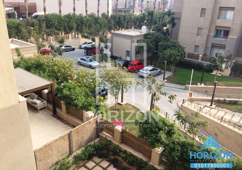 Apartment in The Village Palm Hills New Cairo