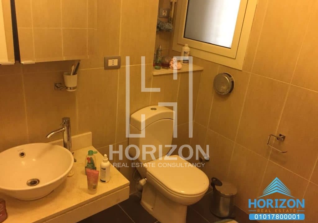 Apartment in The Village Palm Hills New Cairo