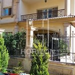 Ground floor with garden for sale in front of AUC New Cairo