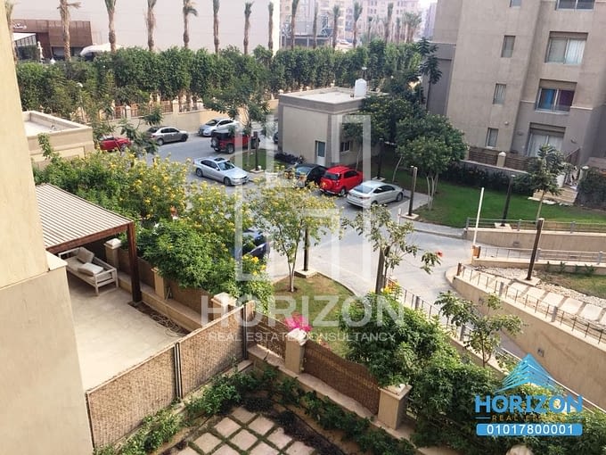 Apartment in The Village Palm Hills New Cairo