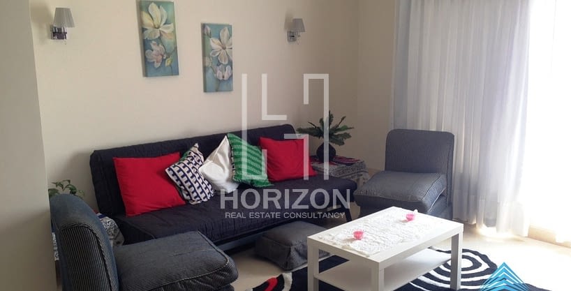 Studio with garden for rent in The Village Palm Hills New Cairo