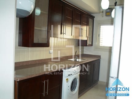 Luxury furnished studio in The Village Palm Hills  New Cairo