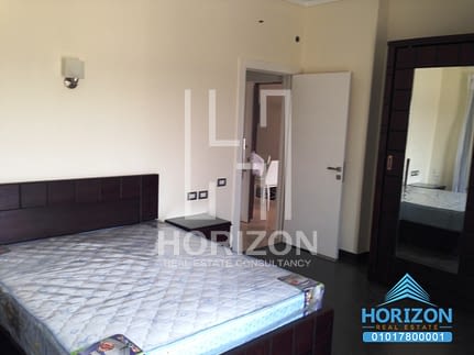 Studio with garden for rent in The Village Palm Hills New Cairo