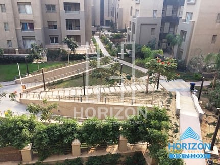 Apartment in The Village Palm Hills New Cairo